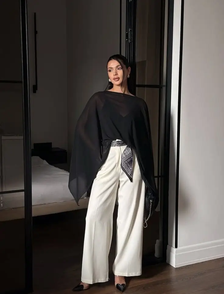 blusa preta transparente elegante