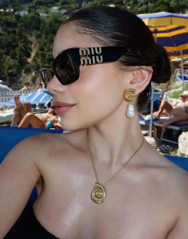 Óculos de Sol Miu Miu com Dourado